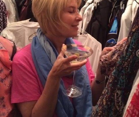 Cleaning closet with a martini in hand